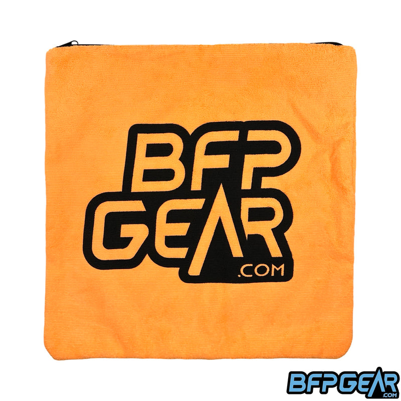 The BFPGear versatile microfiber bag in orange. The BFPGear.com logo is silk screen printed onto the bag.