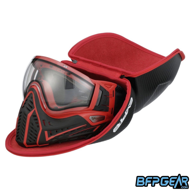 The inside of the Empire goggle Case has red microfiber finish to protect your lens from scratches. This photo shows a Profiler 2.0 inside, facing to the left, meaning you can use almost any paintball mask for this case.