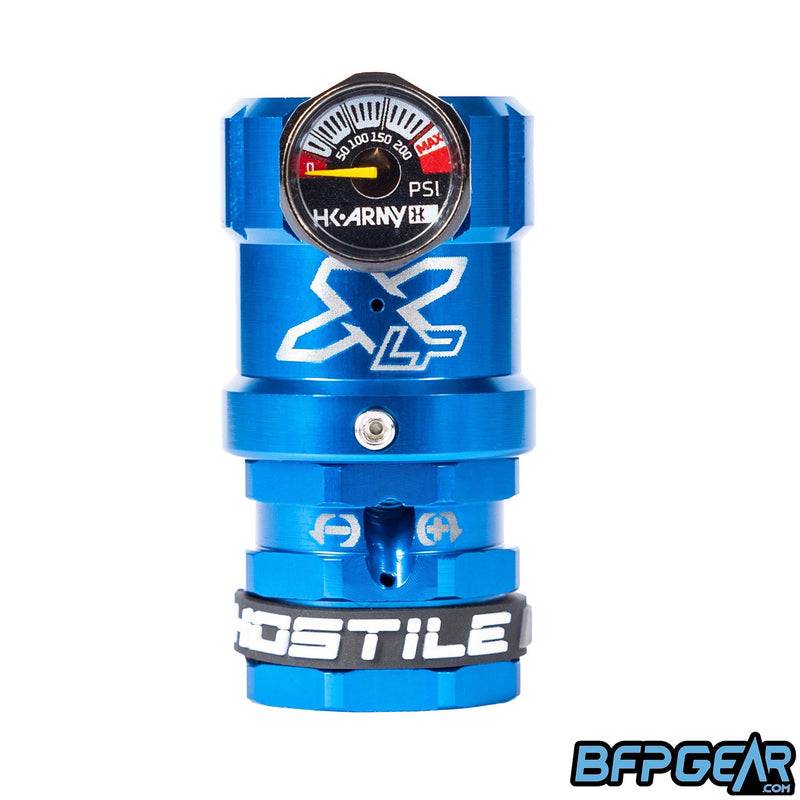 The Hostile XLP Regulator in blue - side feed. This regulator helps turn the output pressure down so you can use it for your airsoft HPA setup.