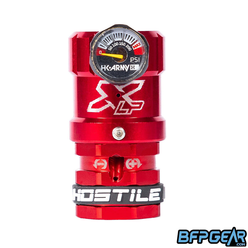 The Hostile XLP Regulator in red - side feed. This regulator helps turn the output pressure down so you can use it for your airsoft HPA setup.