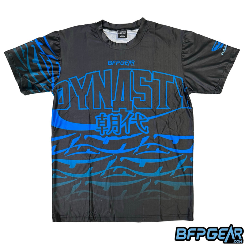 The front of the Neon Dynasty Stretchy Soft Shirt. Dynasty logo pops up as just a blue outline, like a neon sign. The BFPGear.com logo is just above that, and the JT Banana logo is under the Dynasty logo. The JT Banana logo pattern fades as it goes down the shirt.