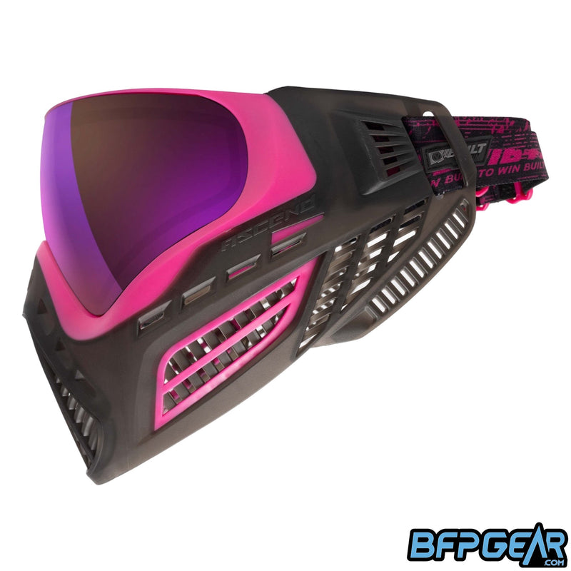 The Vio Ascend SE Black Pink facing left. These special edition goggles come with the 4-point strap, triple layered foam, and the black color is translucent.