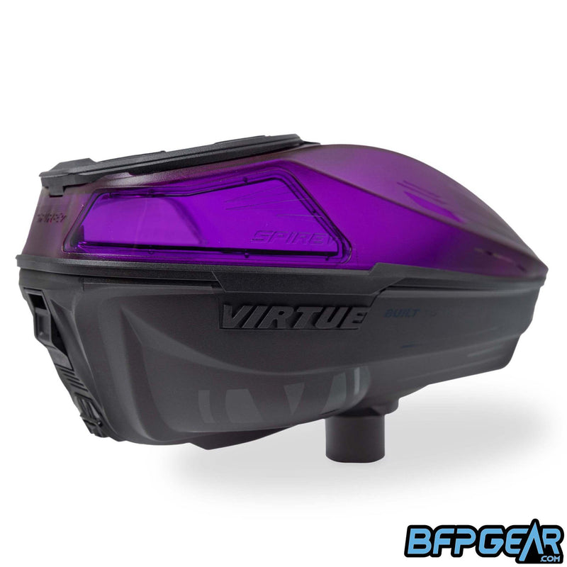 An angled view of the Crystal Purple Spire V paintball loader. This shows the button to open the loader up, as well as the power button located below.